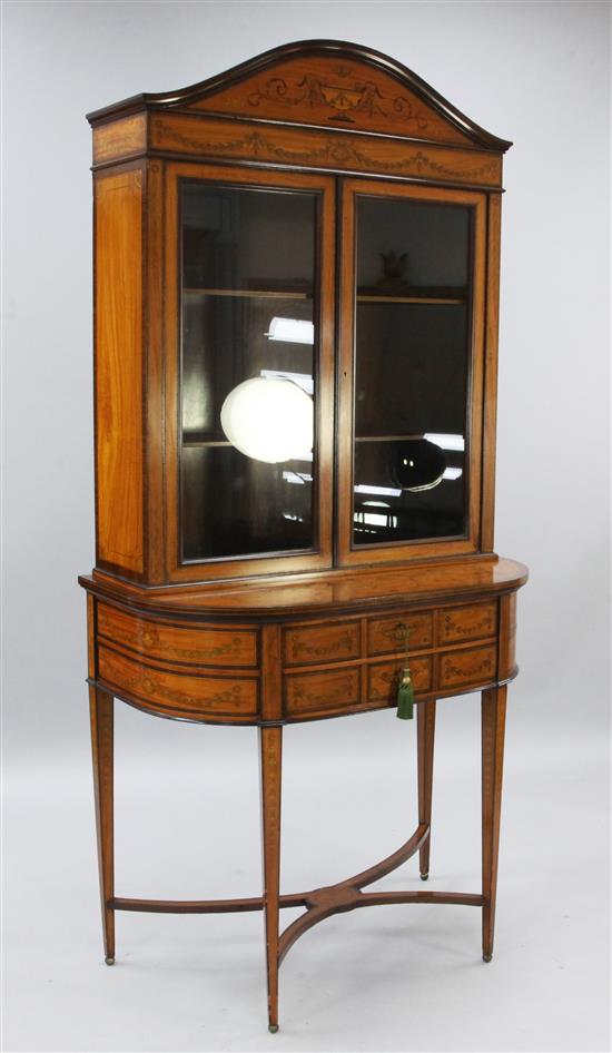 A late Victorian Sheraton revival marquetry inlaid satinwood bookcase, W.3ft D.1ft 9in. H.6ft 6in.